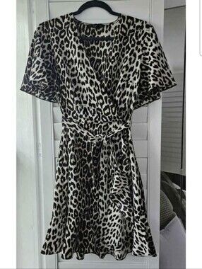 Leopard Print Wrap Dress With Flutter Sleeves And Ruffled Hem